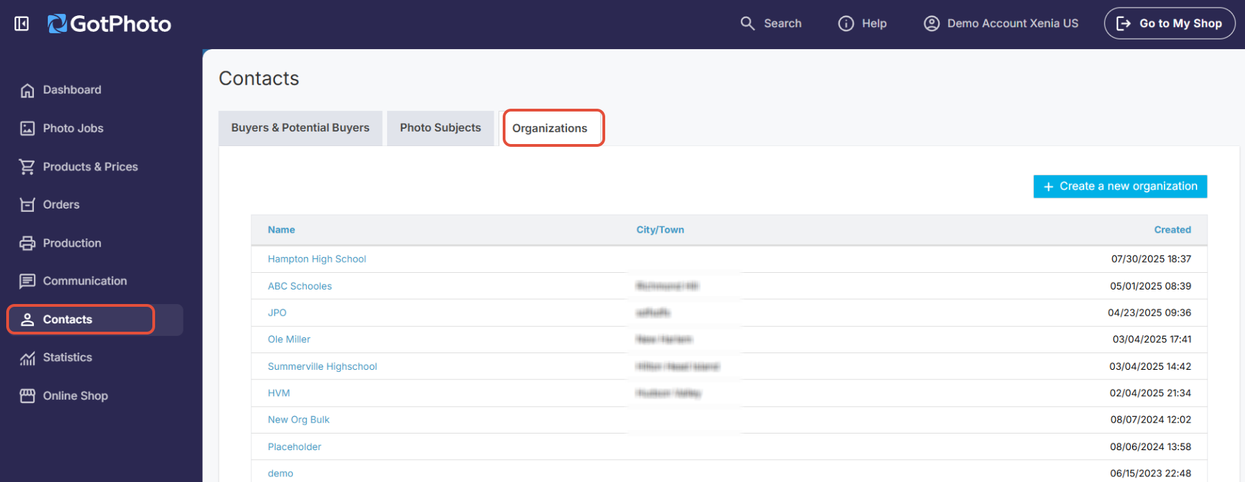 Dashboard view showing the Contacts tab and Organizations section highlighted, with the 'Create a new organization' button visible.